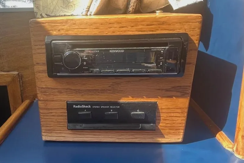 Slide: The Image of 1973 Uniflite Sport Fisher with Kenwood stereo and RadioShack speaker selector. - 64