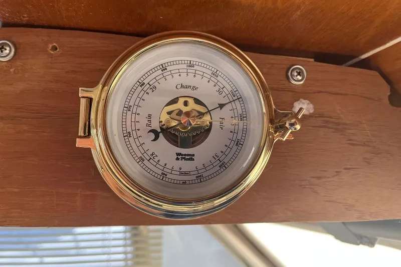 Slide: The Image of Barometer on 1973 Uniflite Sport Fisher boat, mounted on wooden panel. - 76