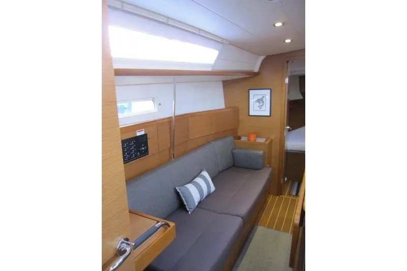 Slide: The Image of Interior of 2013 Jeanneau 379 sailboat with cozy seating and modern design. - 13