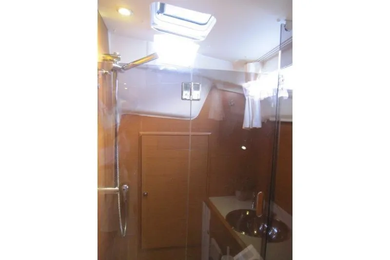 Slide: The Image of Interior of 2013 Jeanneau 379 yacht bathroom with shower and sink. - 22