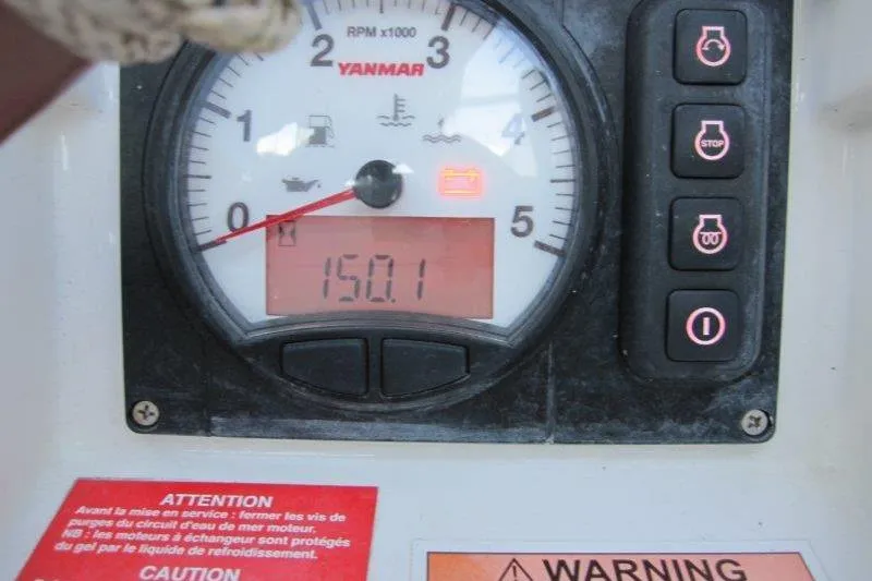 Slide: The Image of Yanmar engine gauge on 2013 Jeanneau 379 sailboat, displaying 150.1 hours. - 35
