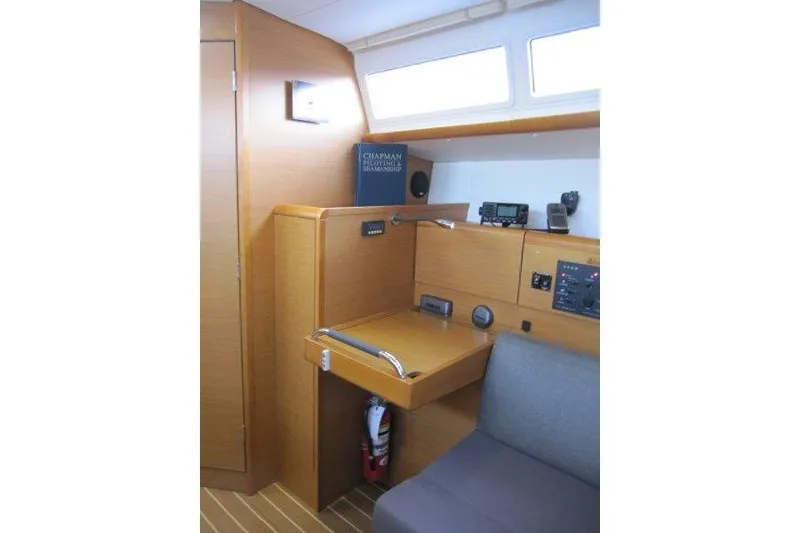 Slide: The Image of Interior of 2013 Jeanneau 379 sailboat with navigation station and equipment. - 4