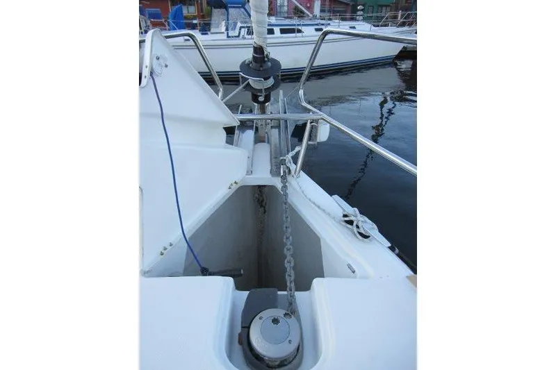 Slide: The Image of 2013 Jeanneau 379 sailboat anchor chain and windlass system on deck. - 43