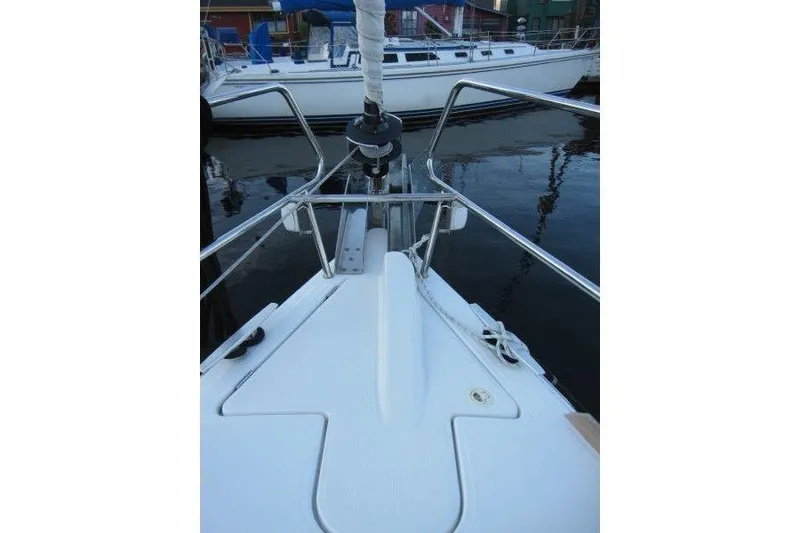 Slide: The Image of Bow view of 2013 Jeanneau 379 sailboat docked in marina. - 44