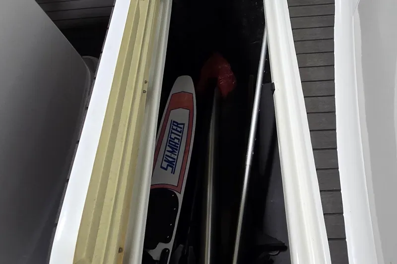 Slide: The Image of Storage compartment of 2007 Sea-Doo Islandia SE with water sports equipment. - 15