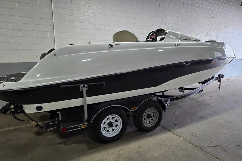 Slide: The Image of 2007 Sea-Doo Islandia SE boat on trailer in indoor storage facility. - 3