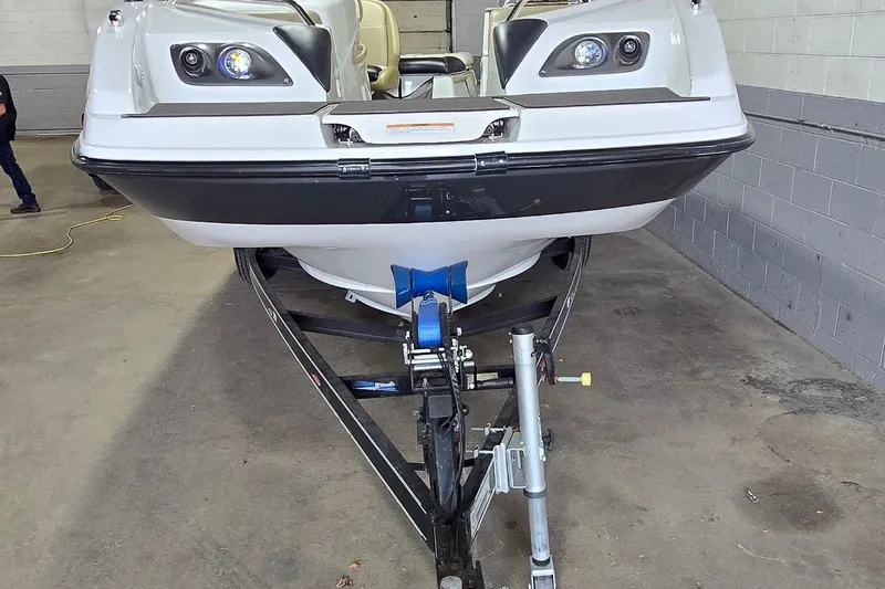 Slide: The Image of 2007 Sea-Doo Islandia SE boat on trailer in garage setting. - 8
