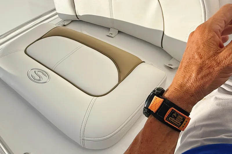 Slide: The Image of 2015 Sportsman Heritage 231 Center Console boat with speakers and stainless steel supports. - 15