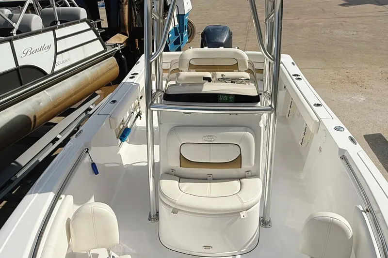 Slide: The Image of Yamaha tachometer displaying 220 hours on a 2015 Sportsman Heritage 231 Center Console. - 17