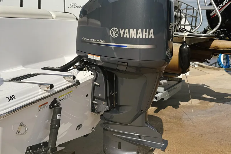 Slide: The Image of 2015 Sportsman Heritage 231 Center Console with Yamaha four-stroke outboard engine. - 23