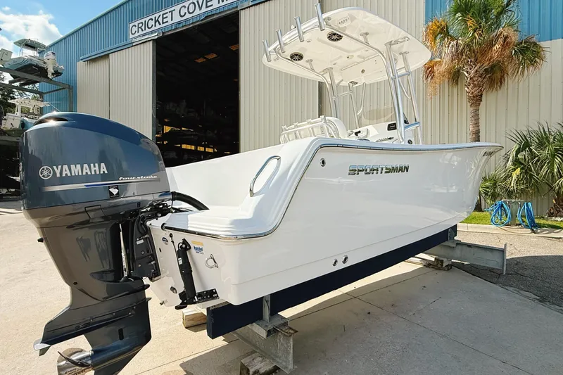 Slide: The Image of 2015 Sportsman Heritage 231 Center Console boat with Yamaha engine at Cricket Cove Marina. - 28