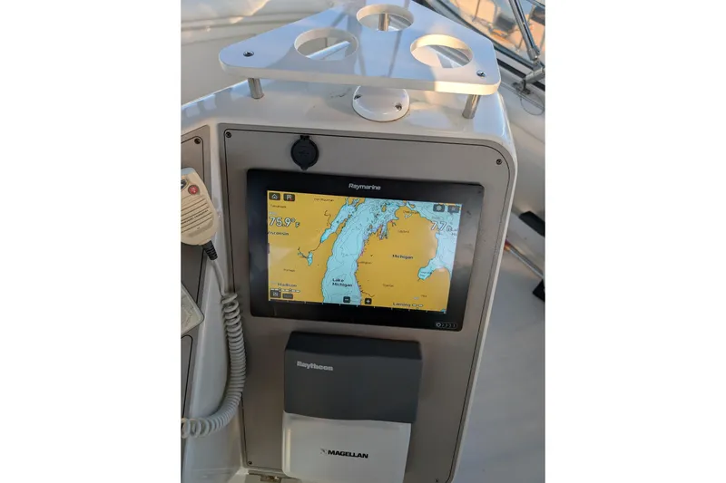 Slide: The Image of 1998 Carver 445 Aft Cabin Motor Yacht logo on hull. - 33