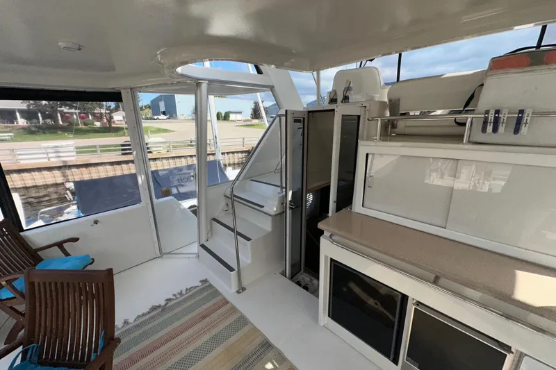 Slide: The Image of Control panel of a 1998 Carver 445 Aft Cabin Motor Yacht with navigation instruments. - 46