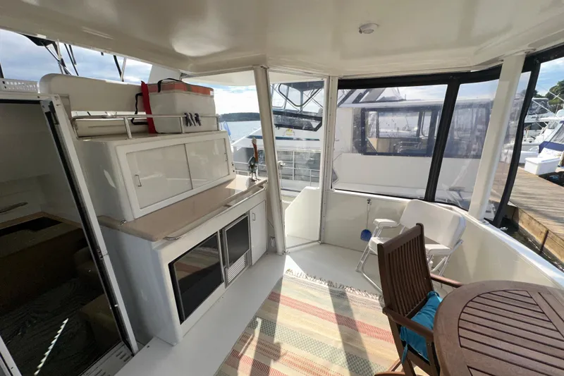 Slide: The Image of Control panel of 1998 Carver 445 Aft Cabin Motor Yacht with gauges and switches. - 47