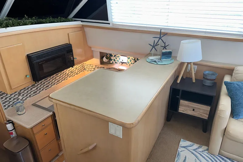 Slide: The Image of Cozy bedroom in 1998 Carver 445 Aft Cabin Motor Yacht with nautical decor. - 63