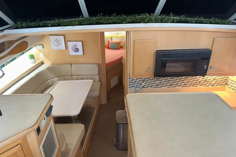 Slide: The Image of Bathroom interior of 1998 Carver 445 Aft Cabin Motor Yacht with pink curtains. - 66