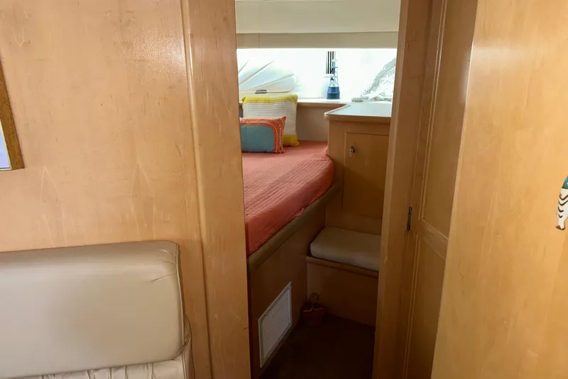 Slide: The Image of Interior of 1998 Carver 445 Aft Cabin Motor Yacht with TV and dining area. - 75