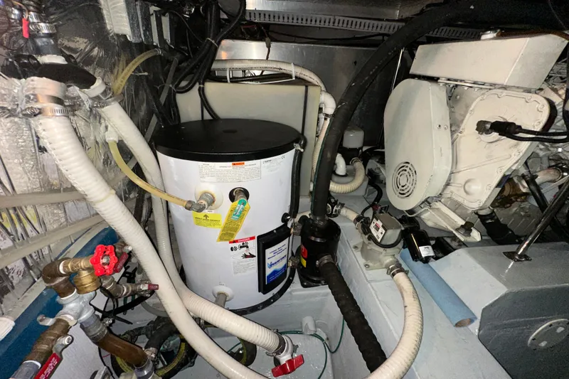 Slide: The Image of Compact kitchen in 1998 Carver 445 Aft Cabin Motor Yacht with modern appliances. - 82