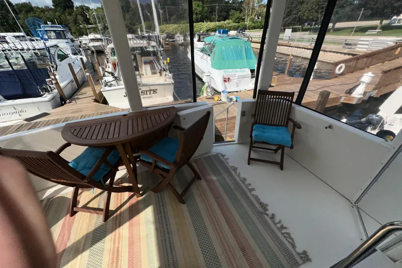 Slide: The Image of Navigation system on 1998 Carver 445 Aft Cabin Motor Yacht, displaying map and temperature. - 44