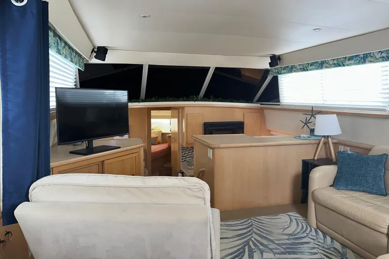 Slide: The Image of Interior of 1998 Carver 445 Aft Cabin Motor Yacht with stairs and decor. - 59