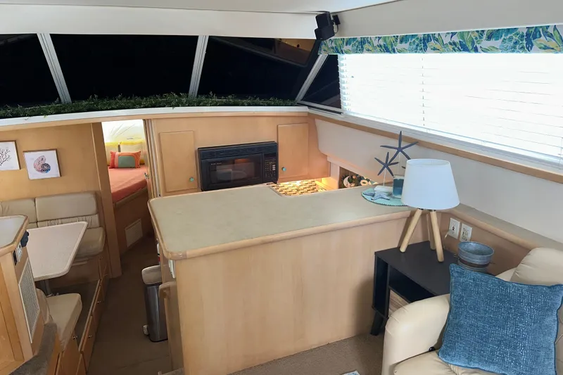 Slide: The Image of Interior of 1998 Carver 445 Aft Cabin Motor Yacht with cozy bedroom and bathroom. - 65