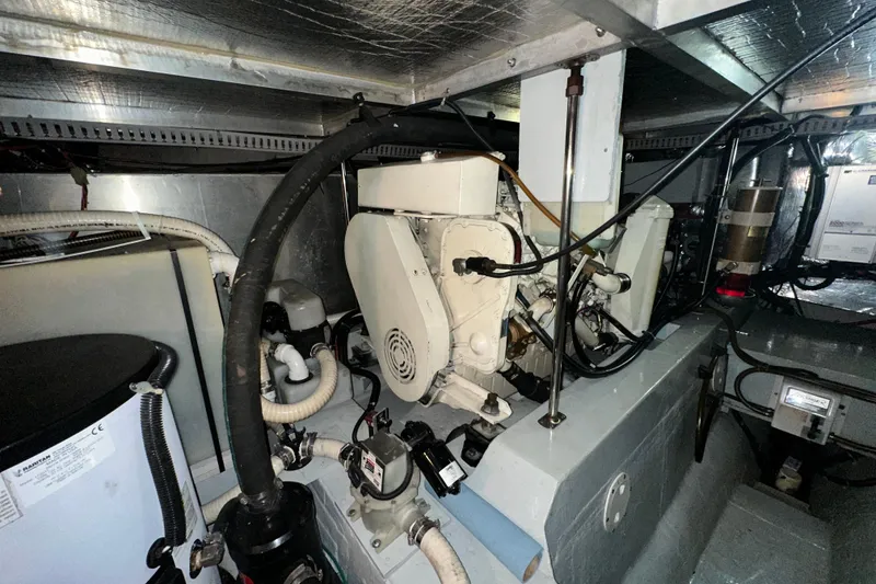 Slide: The Image of Stove in 1998 Carver 445 Aft Cabin Motor Yacht kitchen with backsplash and countertop. - 83