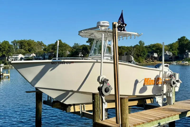The Image of 2025 Cape Horn 22 OS boat docked on a sunny day by the water. - 0