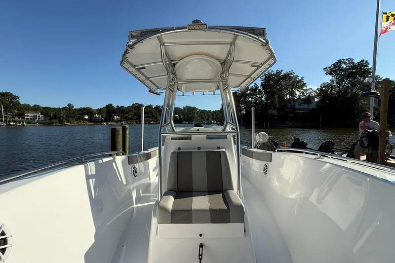 Slide: The Image of 2025 Cape Horn 22 OS boat docked by a scenic waterfront. - 6