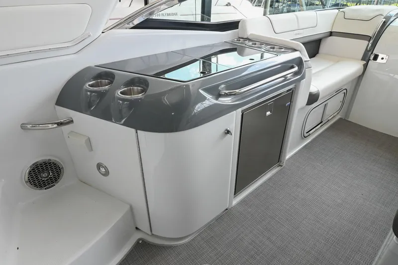 Slide: The Image of 2014 Formula 350 Sun Sport interior with seating and built-in beverage holders. - 28