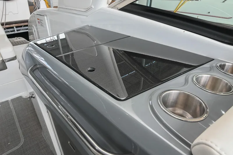 Slide: The Image of 2014 Formula 350 Sun Sport boat interior with sleek countertop and cup holders. - 29