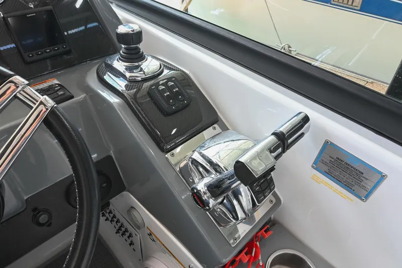 Slide: The Image of Control panel of 2014 Formula 350 Sun Sport boat with joystick and throttle. - 38