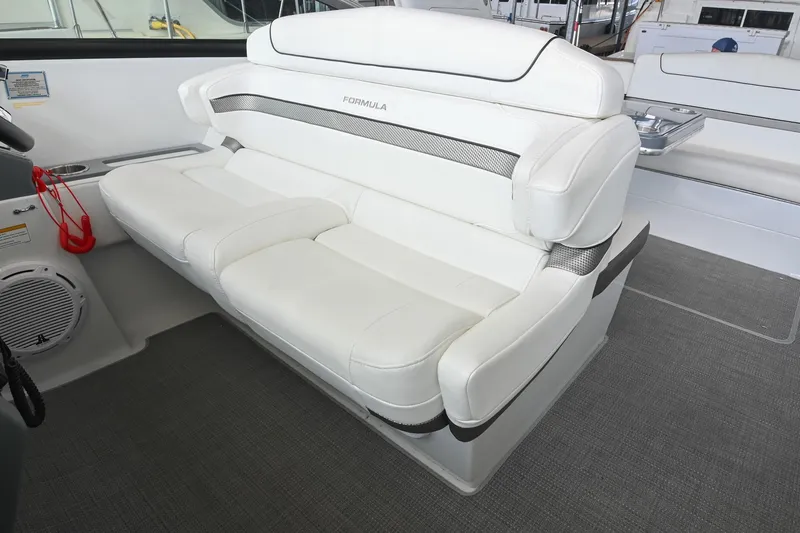 Slide: The Image of 2014 Formula 350 Sun Sport boat interior with white leather seating. - 40