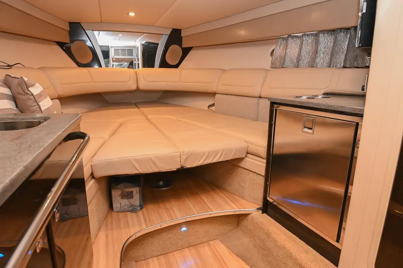 Slide: The Image of Interior of 2014 Formula 350 Sun Sport boat with luxurious seating and kitchenette. - 53