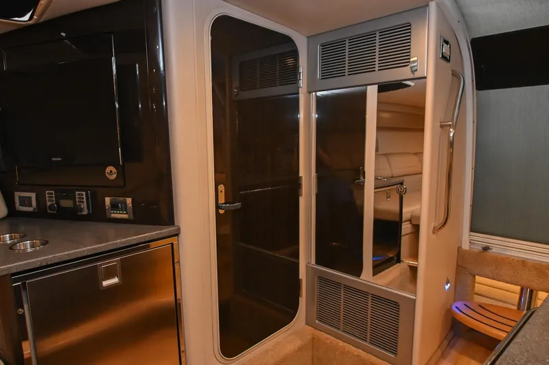 Slide: The Image of Interior of 2014 Formula 350 Sun Sport boat with modern amenities and sleek design. - 61