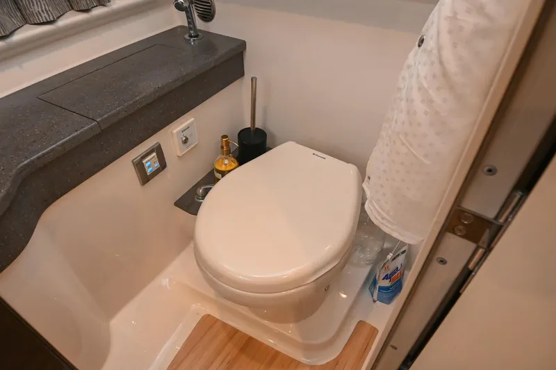 Slide: The Image of 2014 Formula 350 Sun Sport bathroom with modern amenities and sleek design. - 63