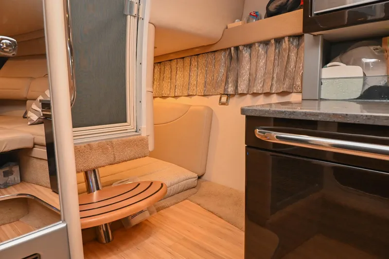 Slide: The Image of Interior of 2014 Formula 350 Sun Sport boat with cozy seating and modern amenities. - 65