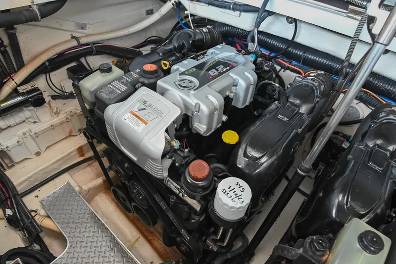 Slide: The Image of Engine compartment of 2014 Formula 350 Sun Sport boat, featuring a powerful V8 engine. - 70