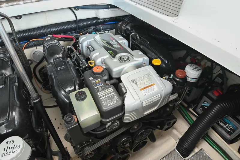 Slide: The Image of Engine compartment of a 2014 Formula 350 Sun Sport boat, featuring a Big Block V8 engine. - 71