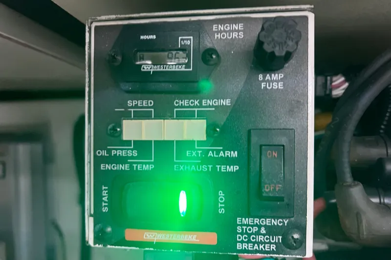 Slide: The Image of Control panel of a 2014 Formula 350 Sun Sport boat with engine indicators. - 74
