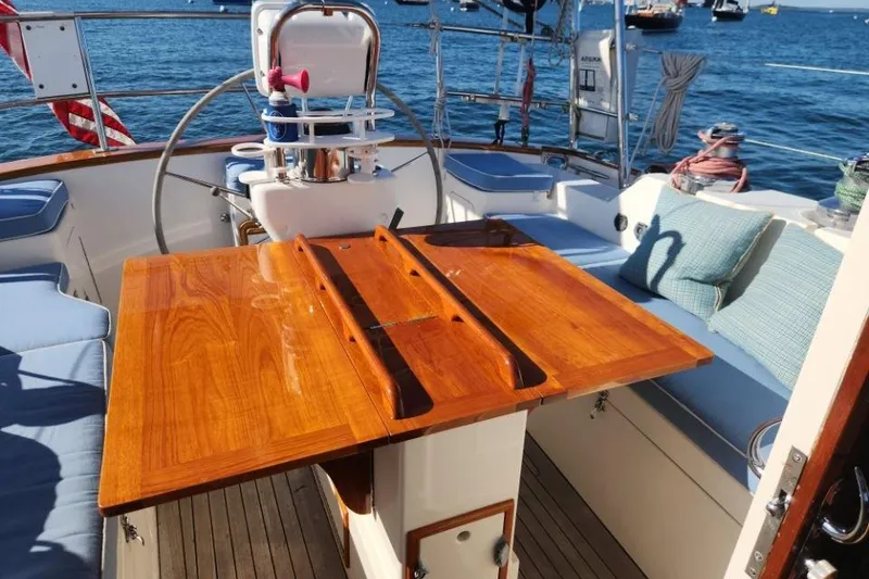 Slide: The Image of Luxurious 2008 Bruckmann 50 MKII yacht interior with polished wood table and comfortable seating. - 21