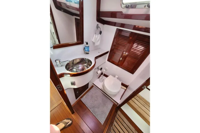 Slide: The Image of Luxurious 2008 Bruckmann 50 MKII yacht bathroom with wooden accents and modern fixtures. - 27