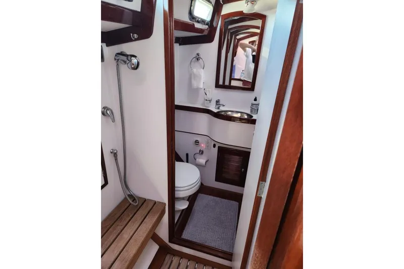 Slide: The Image of Bathroom interior of 2008 Bruckmann 50 MKII yacht with wooden accents and modern fixtures. - 29