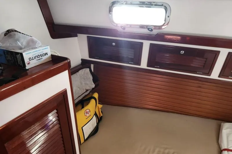 Slide: The Image of Interior cabin of 2008 Bruckmann 50 MKII yacht with wooden storage compartments. - 31