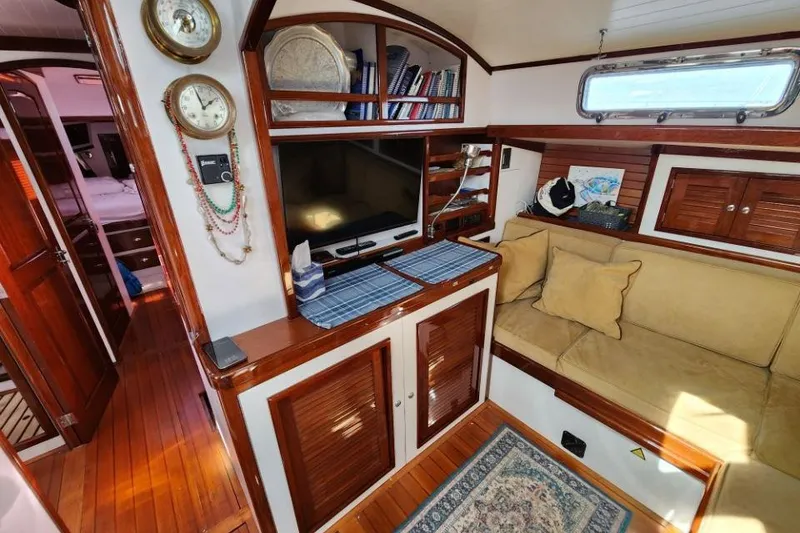 Slide: The Image of Interior of 2008 Bruckmann 50 MKII yacht with cozy seating and wooden finishes. - 39