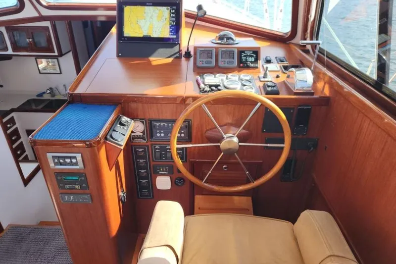 Slide: The Image of Helm of 2008 Bruckmann 50 MKII yacht with navigation equipment and wooden steering wheel. - 45