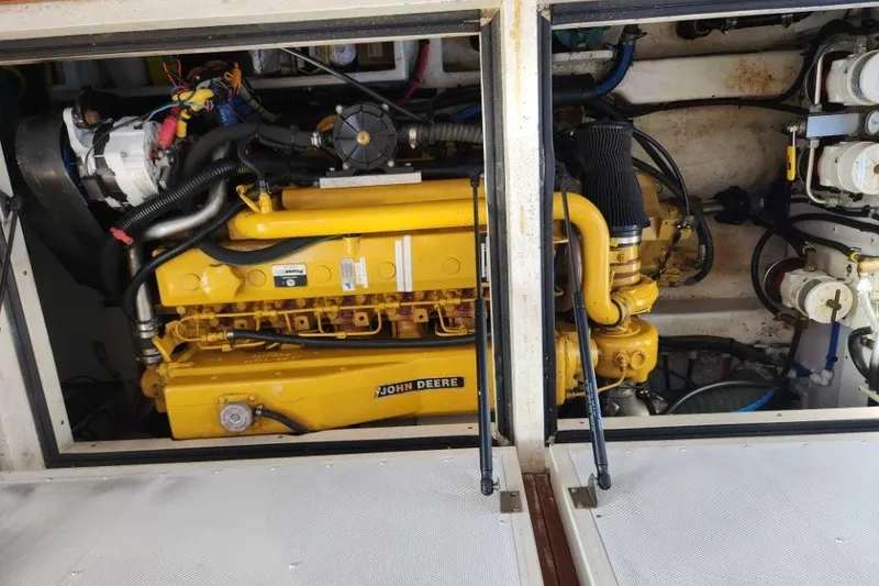 Slide: The Image of Engine compartment of a 2008 Bruckmann 50 MKII with a John Deere engine. - 47