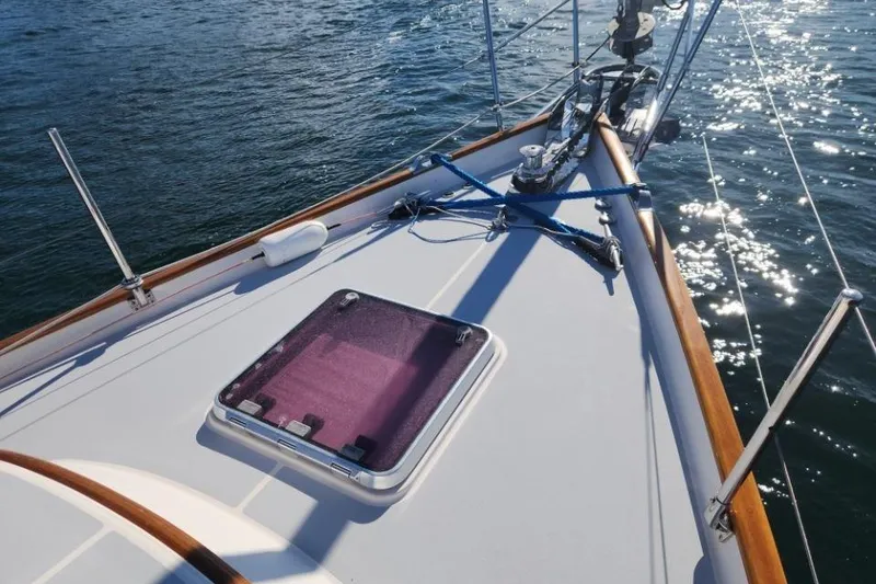Slide: The Image of Deck of 2008 Bruckmann 50 MKII yacht with sunlit water reflections. - 6