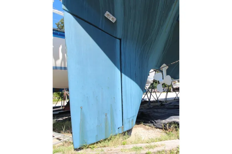 Slide: The Image of 1987 Slocum 43 sailboat keel and propeller in dry dock. - 4