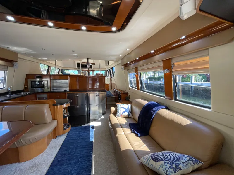 Slide: The Image of Luxurious interior of a 2005 Carver 56 Voyager yacht with elegant furnishings and modern amenities. - 20