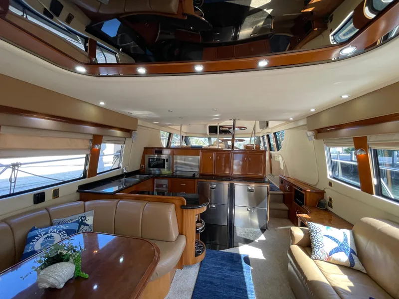 Slide: The Image of Luxurious interior of a 2005 Carver 56 Voyager yacht with modern amenities and elegant design. - 21
